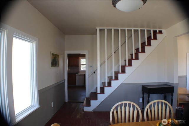 stairs with wood finished floors