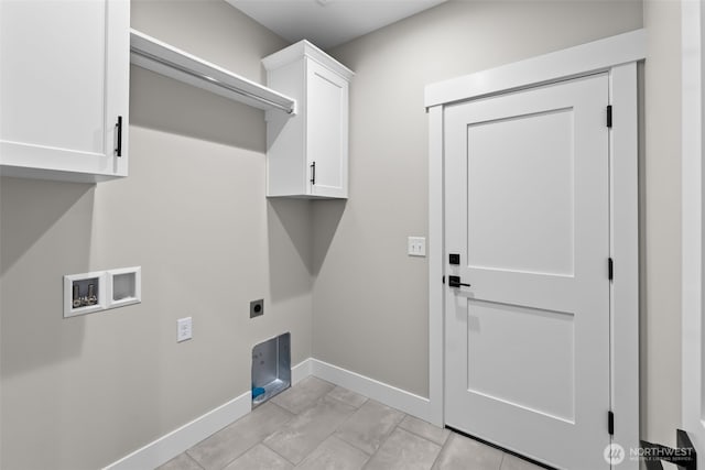 laundry area with electric dryer hookup, baseboards, cabinet space, and hookup for a washing machine