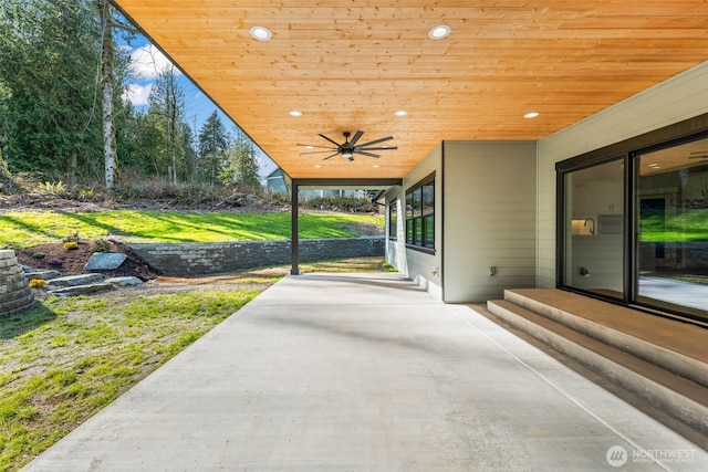 view of patio featuring ceiling fan