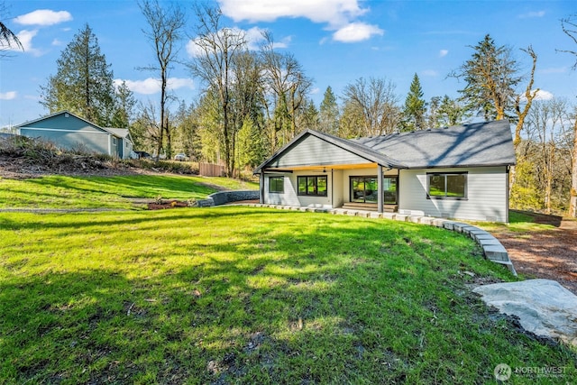 view of front of home with a front lawn