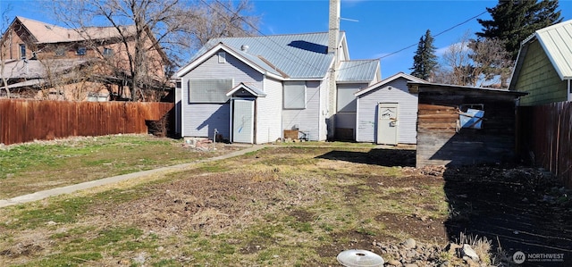 exterior space with a fenced backyard