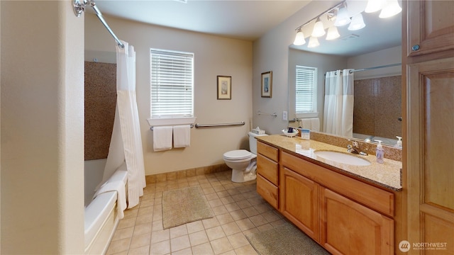 full bathroom featuring vanity, shower / bathtub combination with curtain, baseboards, tile patterned floors, and toilet