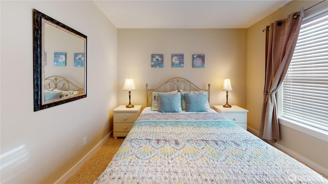 bedroom featuring baseboards