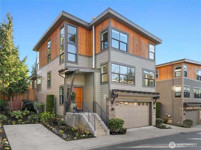 contemporary home featuring driveway and a garage