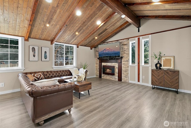 living room with vaulted ceiling with beams, a fireplace, wood ceiling, wood finished floors, and baseboards