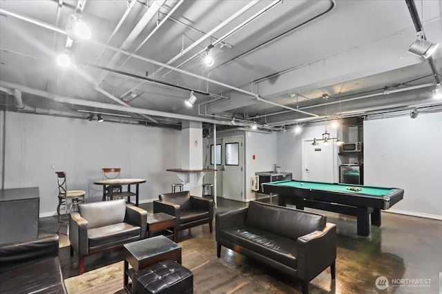 playroom featuring billiards, baseboards, and concrete floors