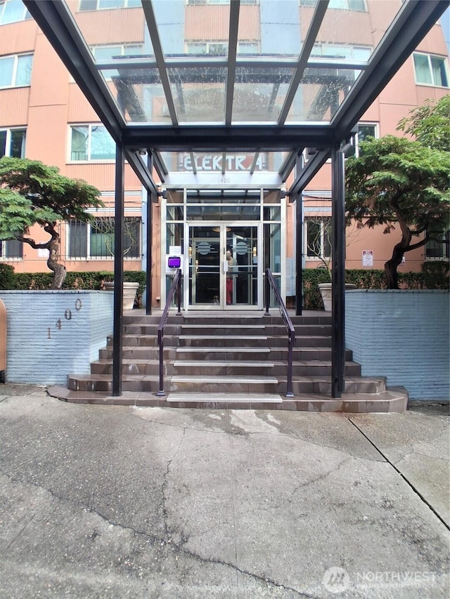 property entrance featuring french doors