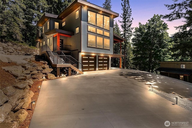 view of front facade with a garage and concrete driveway