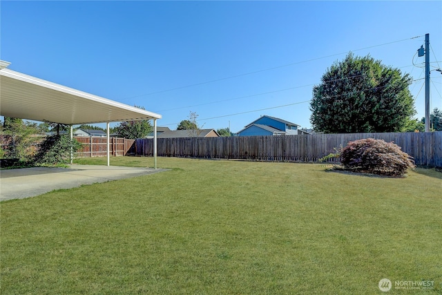 view of yard with a fenced backyard