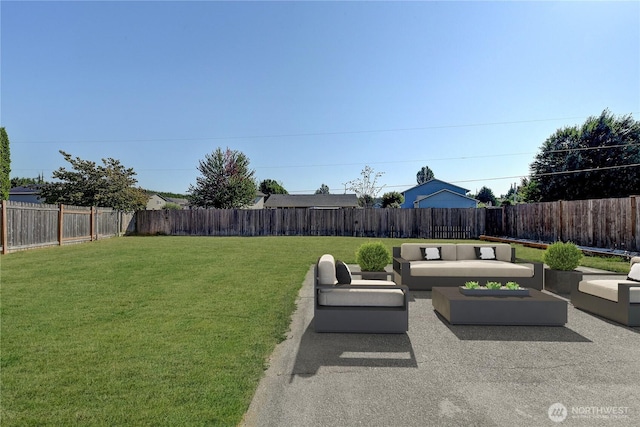 view of yard with a fenced backyard, an outdoor living space, and a patio