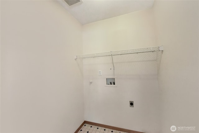 laundry room with light floors, baseboards, hookup for an electric dryer, hookup for a washing machine, and laundry area