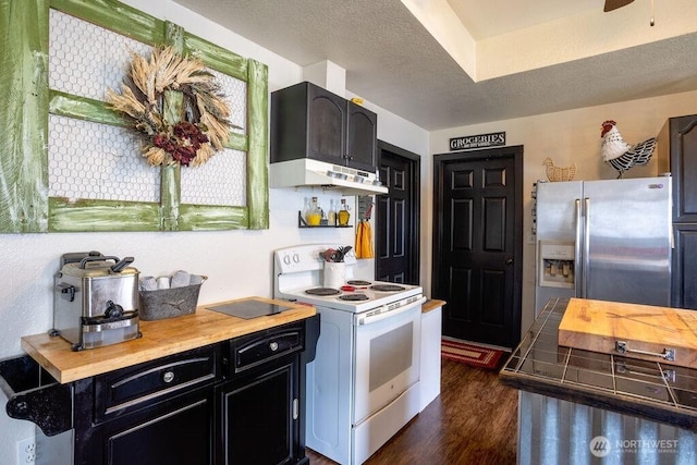 kitchen with dark wood-style flooring, white range with electric cooktop, a textured ceiling, stainless steel fridge, and under cabinet range hood