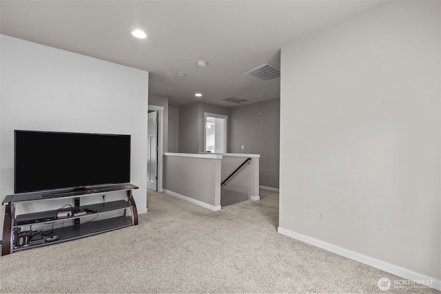 living area featuring recessed lighting, baseboards, visible vents, and carpet floors