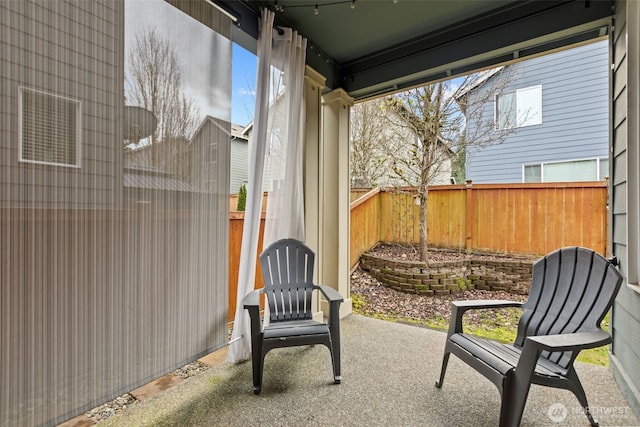 view of patio with a fenced backyard