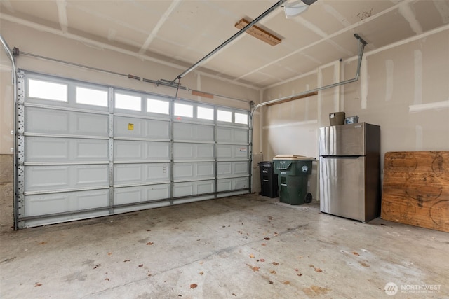 garage featuring freestanding refrigerator