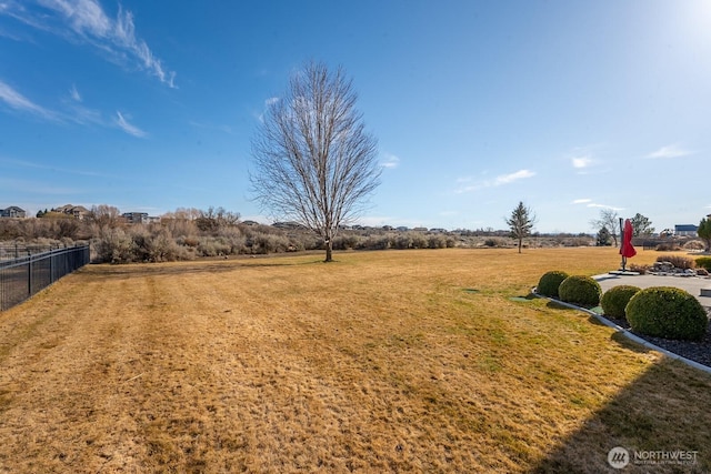 view of yard with fence