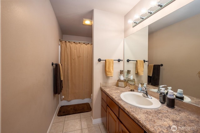 full bath with tile patterned floors, toilet, curtained shower, baseboards, and vanity