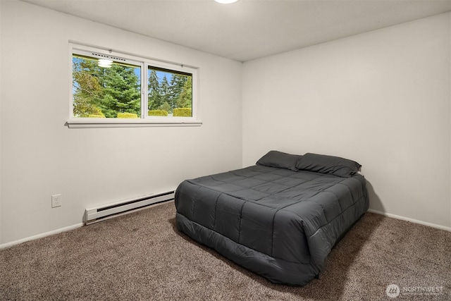 carpeted bedroom with baseboards and baseboard heating