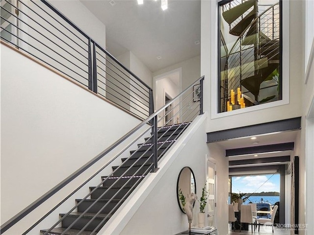6413 Lake Washington Blvd NE, Kirkland, WA 98033 - stairs with a high ceiling