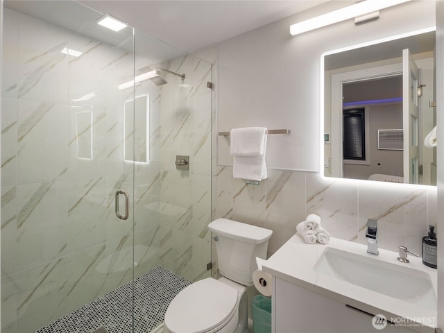 6413 Lake Washington Blvd NE, Kirkland, WA 98033 - full bath featuring tile walls, toilet, a marble finish shower, and vanity
