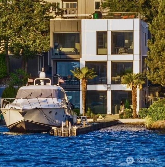 6413 Lake Washington Blvd NE, Kirkland, WA 98033 - view of building exterior with a water view