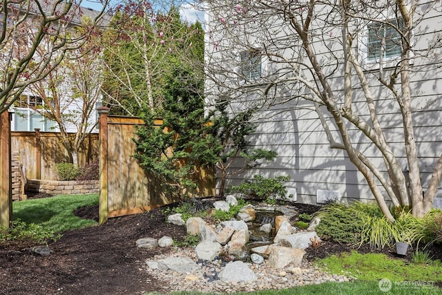 view of yard featuring fence