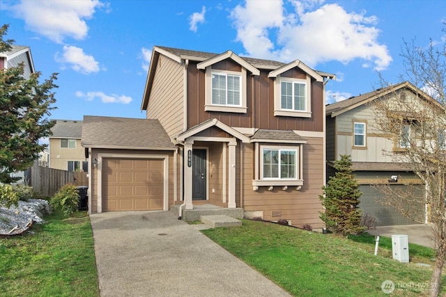 traditional home with fence, driveway, an attached garage, crawl space, and board and batten siding