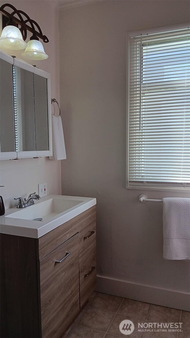 bathroom with vanity, tile patterned floors, and plenty of natural light