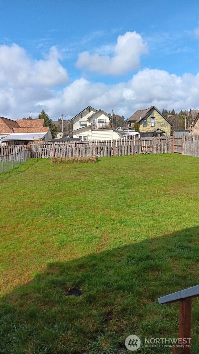 view of yard featuring fence