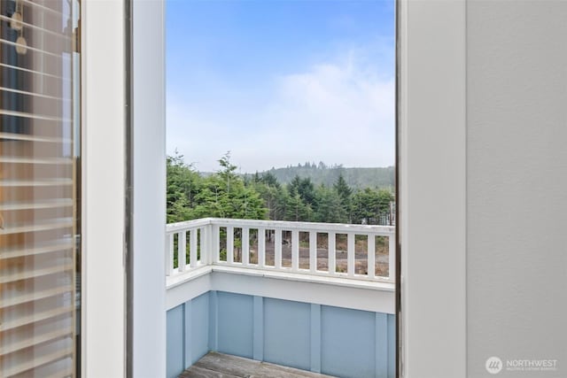 balcony with a forest view