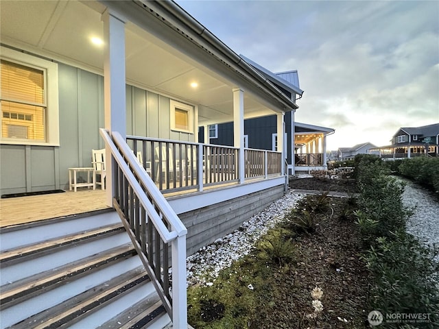 view of home's exterior with a porch and board and batten siding