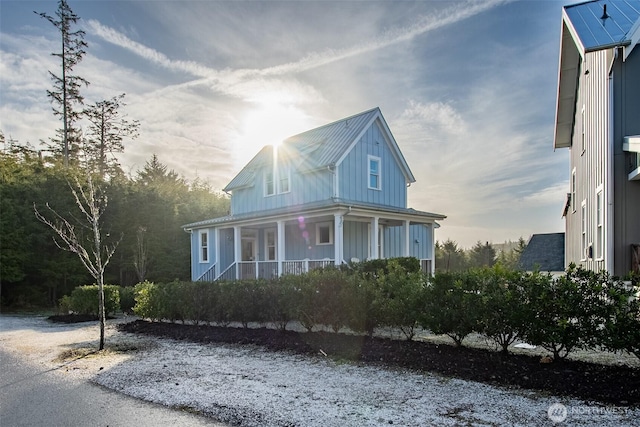 view of front of house featuring covered porch and board and batten siding