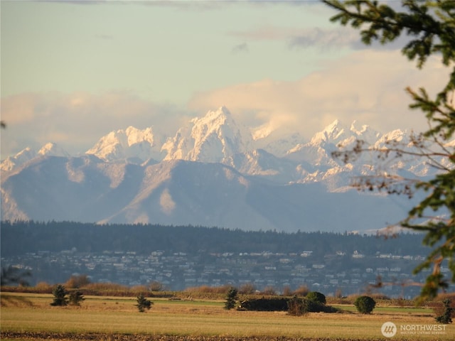 mountain view featuring a rural view