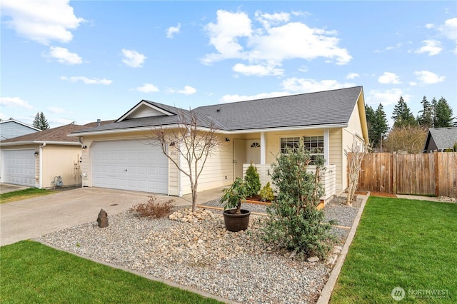 ranch-style house with a front lawn, an attached garage, driveway, and fence