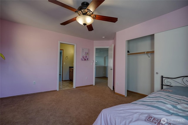 bedroom with a closet, carpet flooring, baseboards, and a ceiling fan