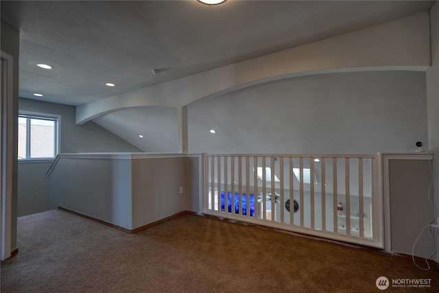 unfurnished room featuring lofted ceiling, recessed lighting, and carpet floors