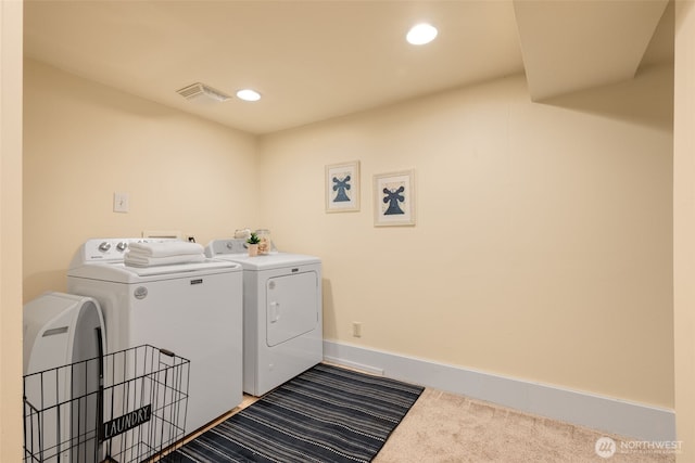 washroom with baseboards, visible vents, laundry area, recessed lighting, and washer and dryer