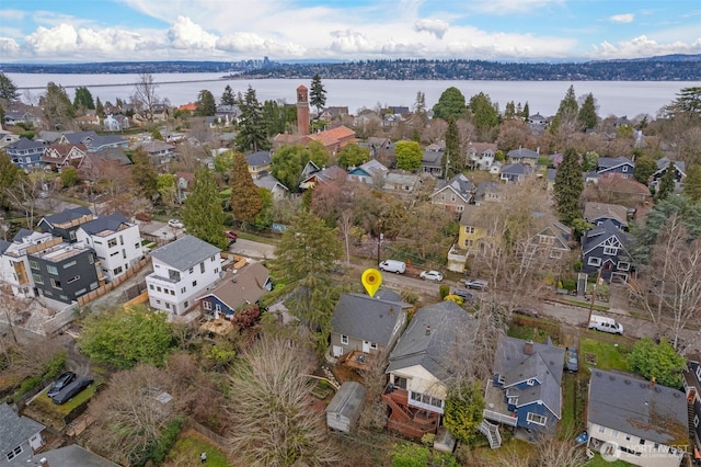 aerial view with a residential view and a water view