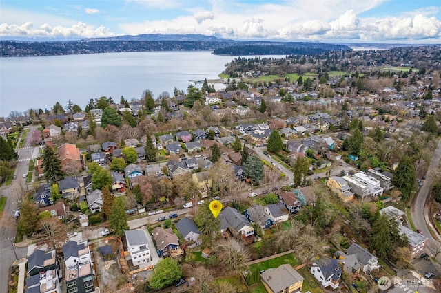 aerial view featuring a residential view and a water view