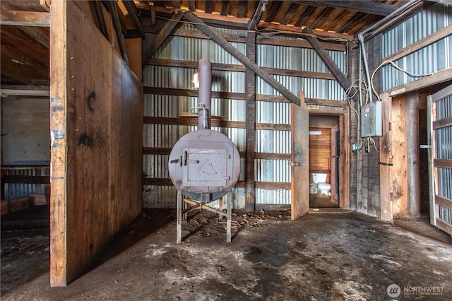 view of horse barn featuring electric panel