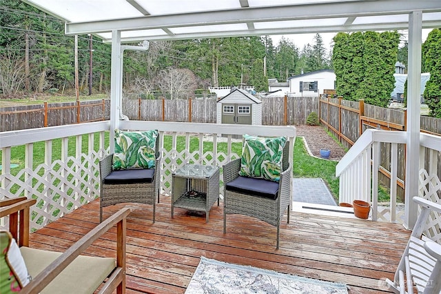 deck featuring a fenced backyard