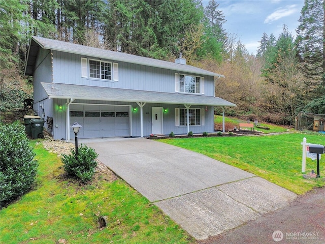 view of front of house featuring a front lawn, a porch, concrete driveway, an attached garage, and a chimney