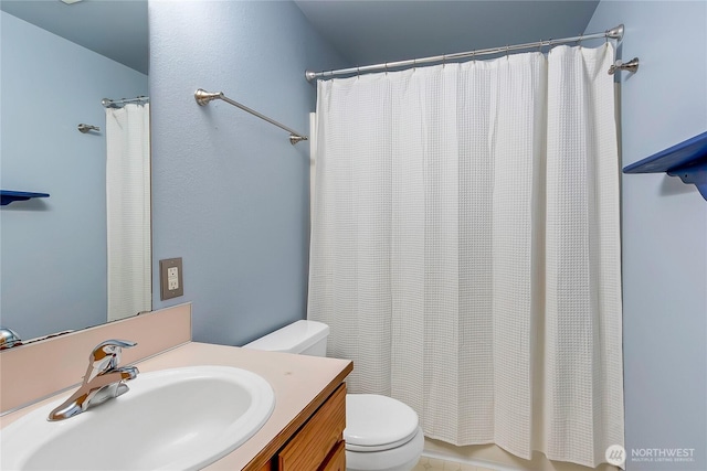 full bath with a shower with shower curtain, toilet, and vanity