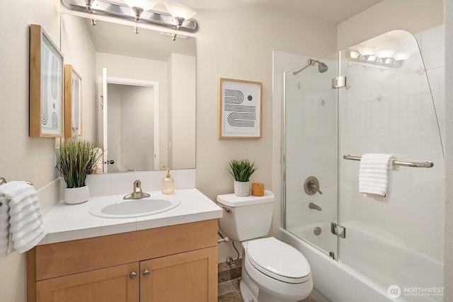 full bathroom featuring vanity, toilet, and shower / bath combination