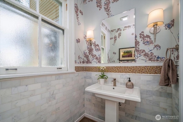 bathroom with tile walls and wainscoting