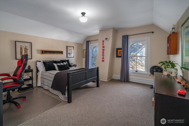 bedroom featuring lofted ceiling, carpet, and baseboards