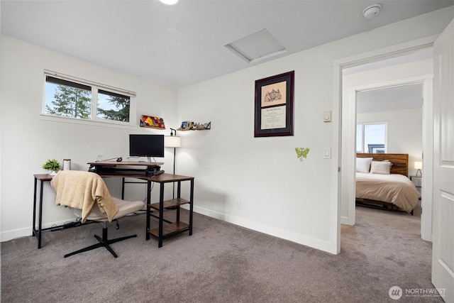 office space with attic access, carpet flooring, and baseboards