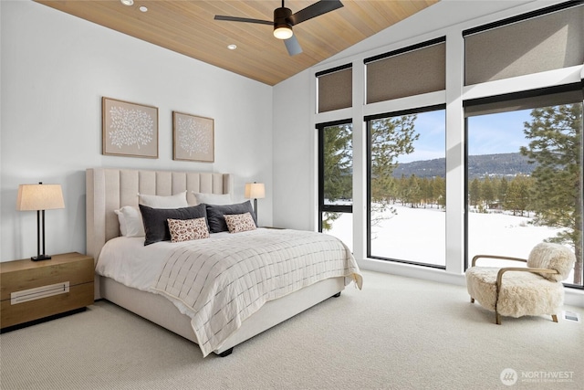 bedroom featuring carpet flooring, wooden ceiling, multiple windows, and lofted ceiling