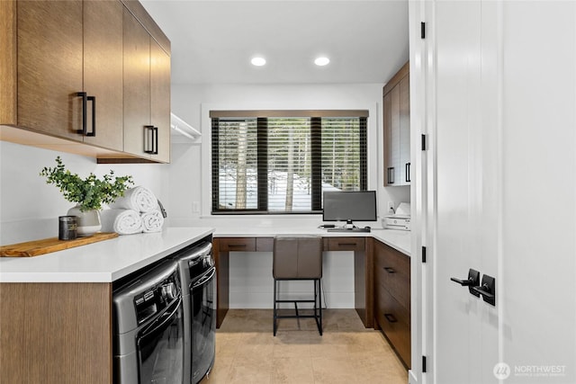 interior space with oven, built in desk, recessed lighting, light tile patterned flooring, and light countertops