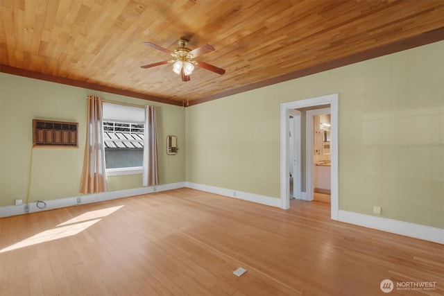 unfurnished room with a wall mounted AC, ceiling fan, wood finished floors, wooden ceiling, and baseboards